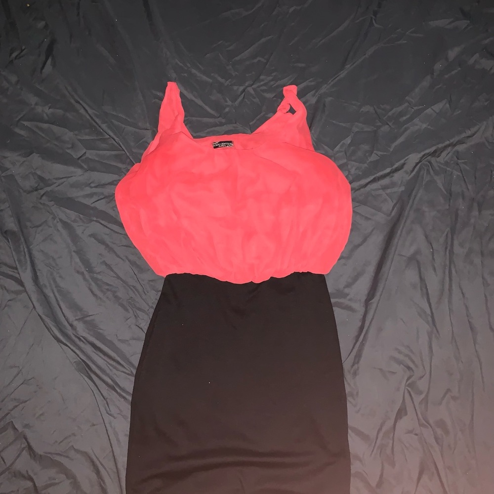 An orange tank dress. Designer unknown. Size Medium.